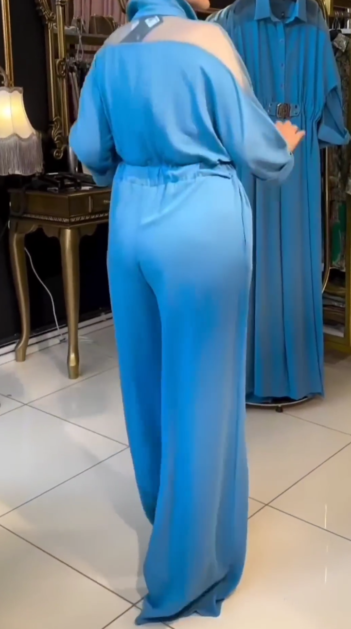 Tuta intera elegante in tessuto voile a maniche lunghe