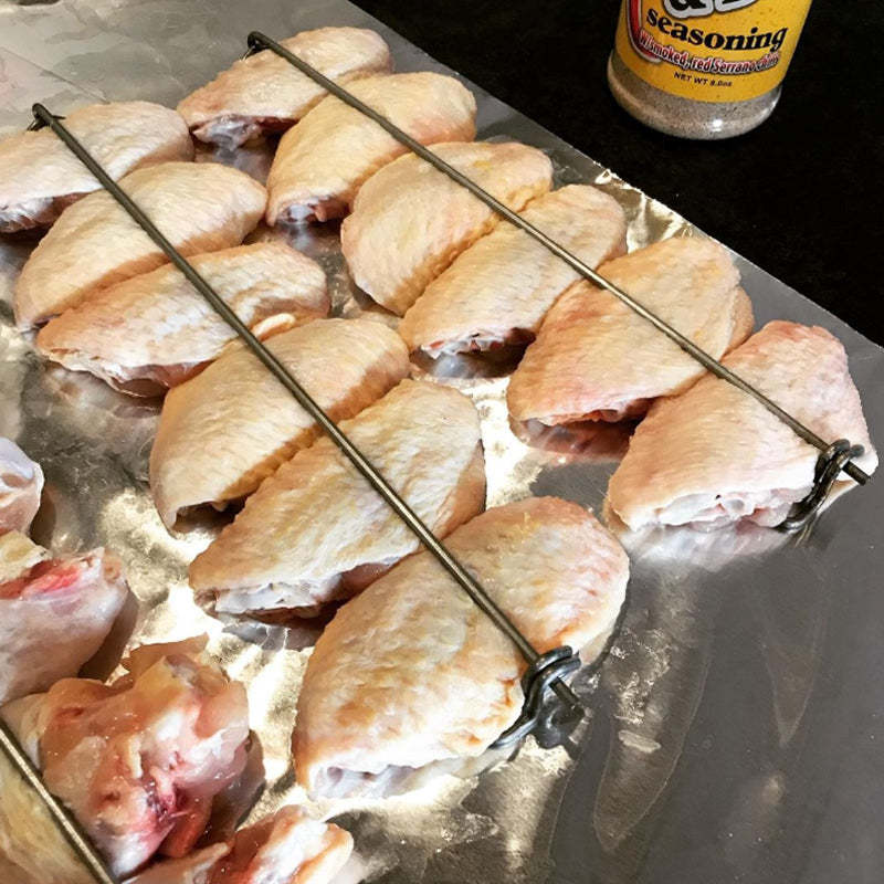Forchetta per barbecue con ala di pollo