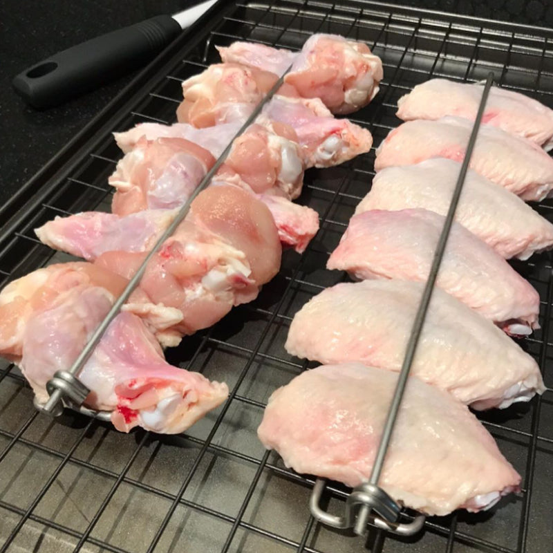 Forchetta per barbecue con ala di pollo