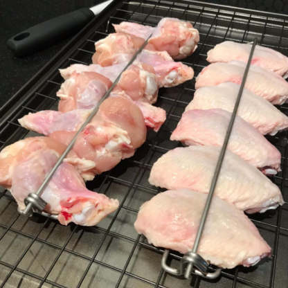 Forchetta per barbecue con ala di pollo