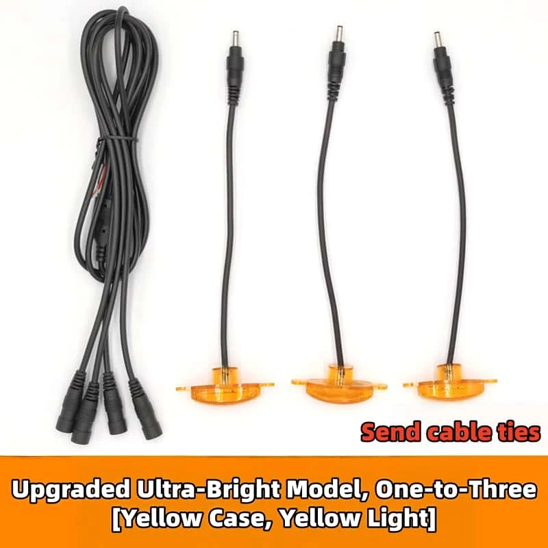 small yellow light on car grille