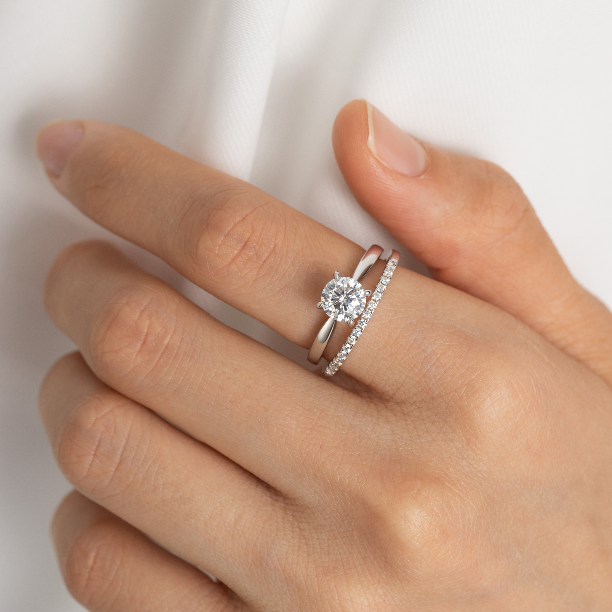 Four Prong Solitaire Moissanite Engagement Ring in White Gold with Eternity Wedding Ring