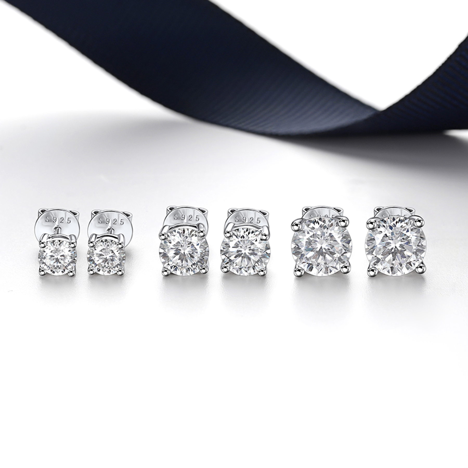 4 Prong Round Stud Moissanite Earrings in White Gold (D Color VVS1)
