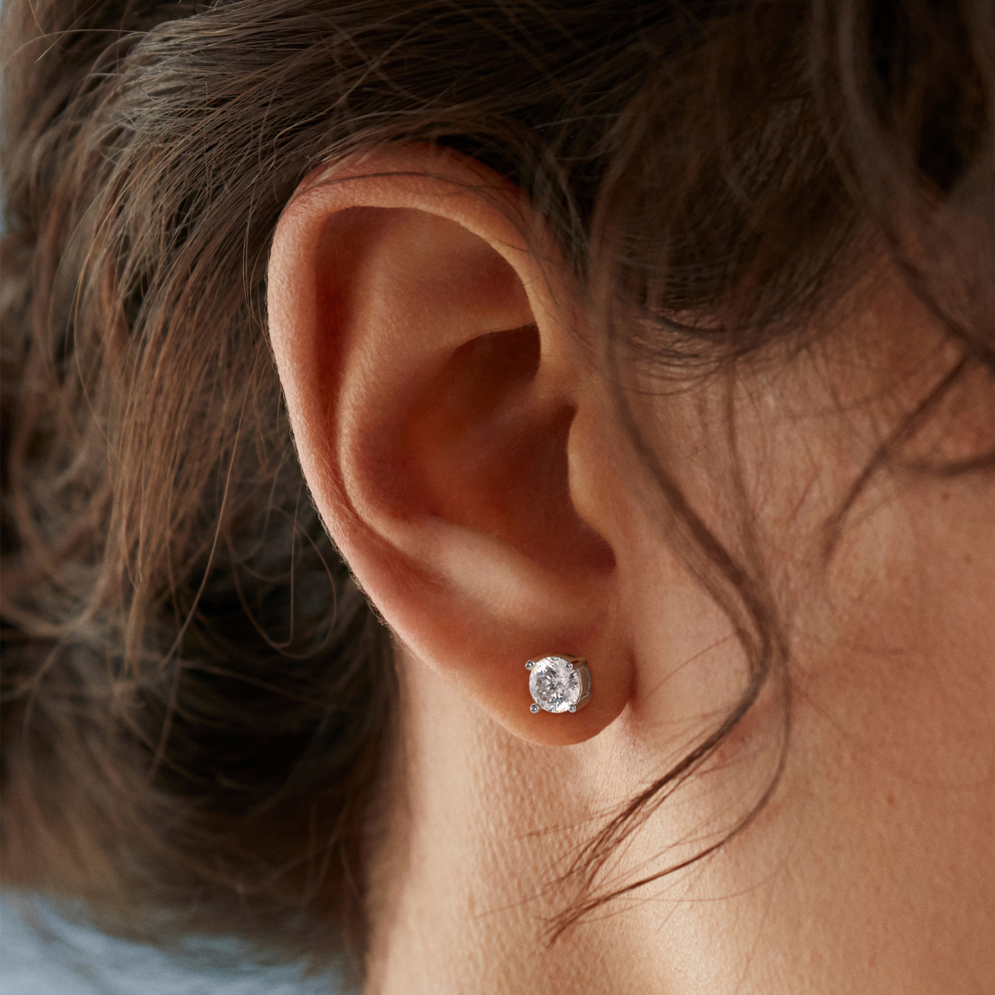 4 Prong Round Stud Moissanite Earrings in White Gold (D Color VVS1)