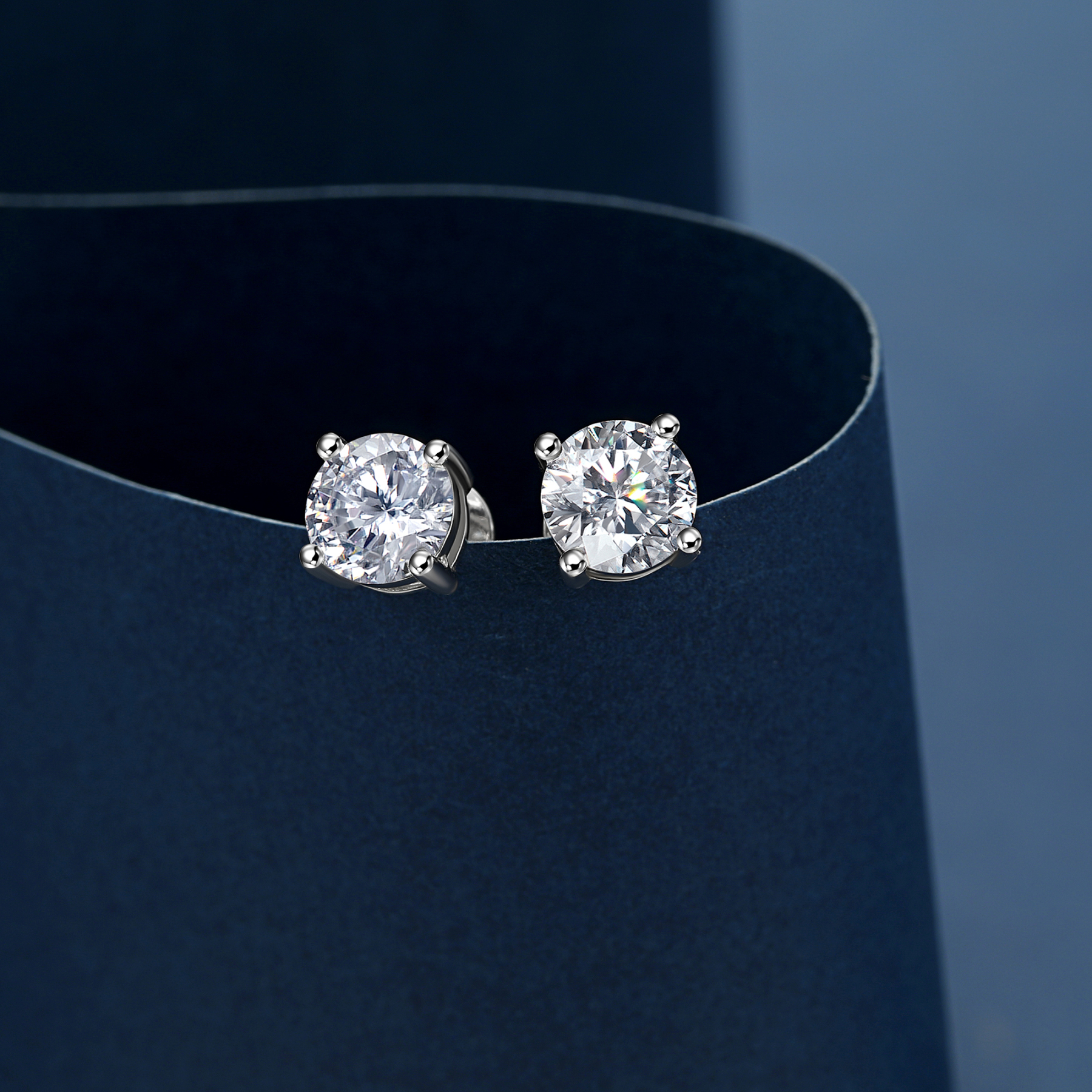 4 Prong Round Stud Moissanite Earrings in White Gold (D Color VVS1)