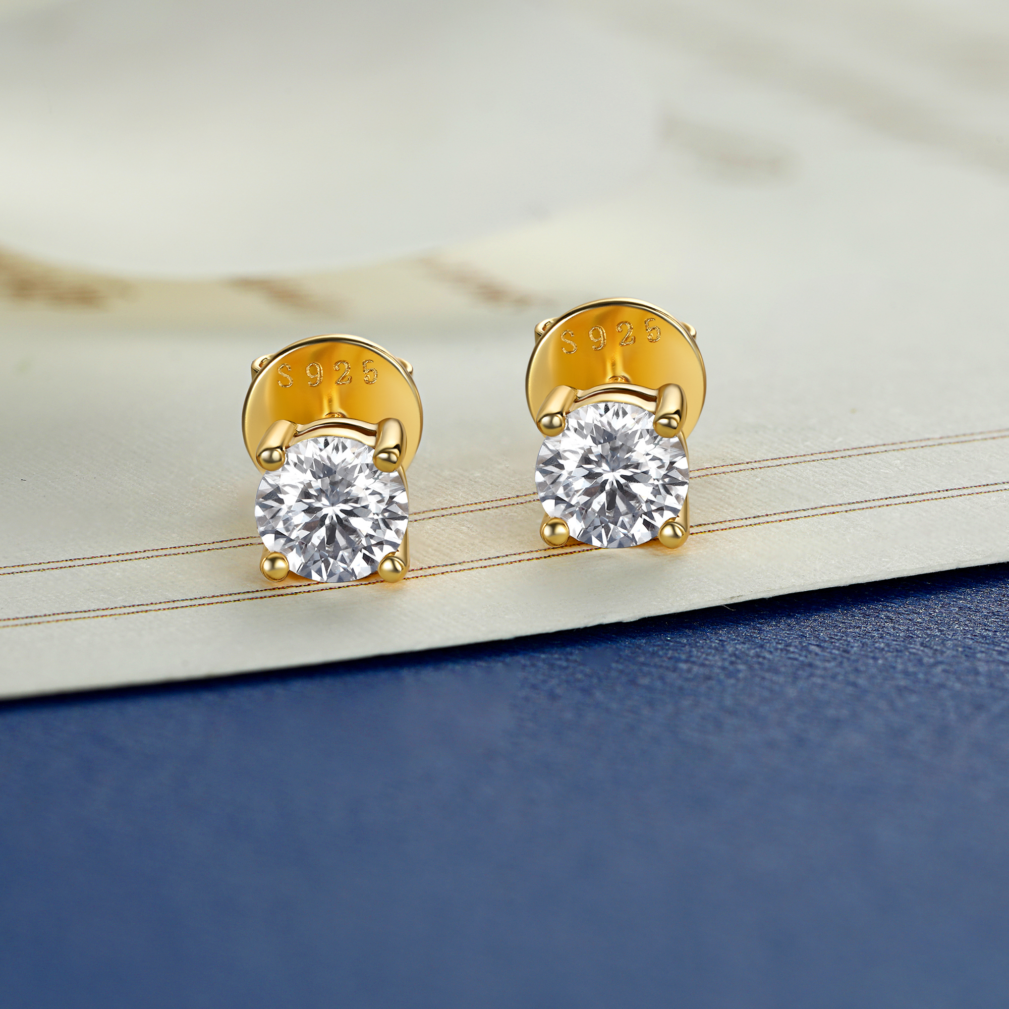 4 Prong Round Stud Moissanite Earrings in Yellow Gold (D Color VVS1)