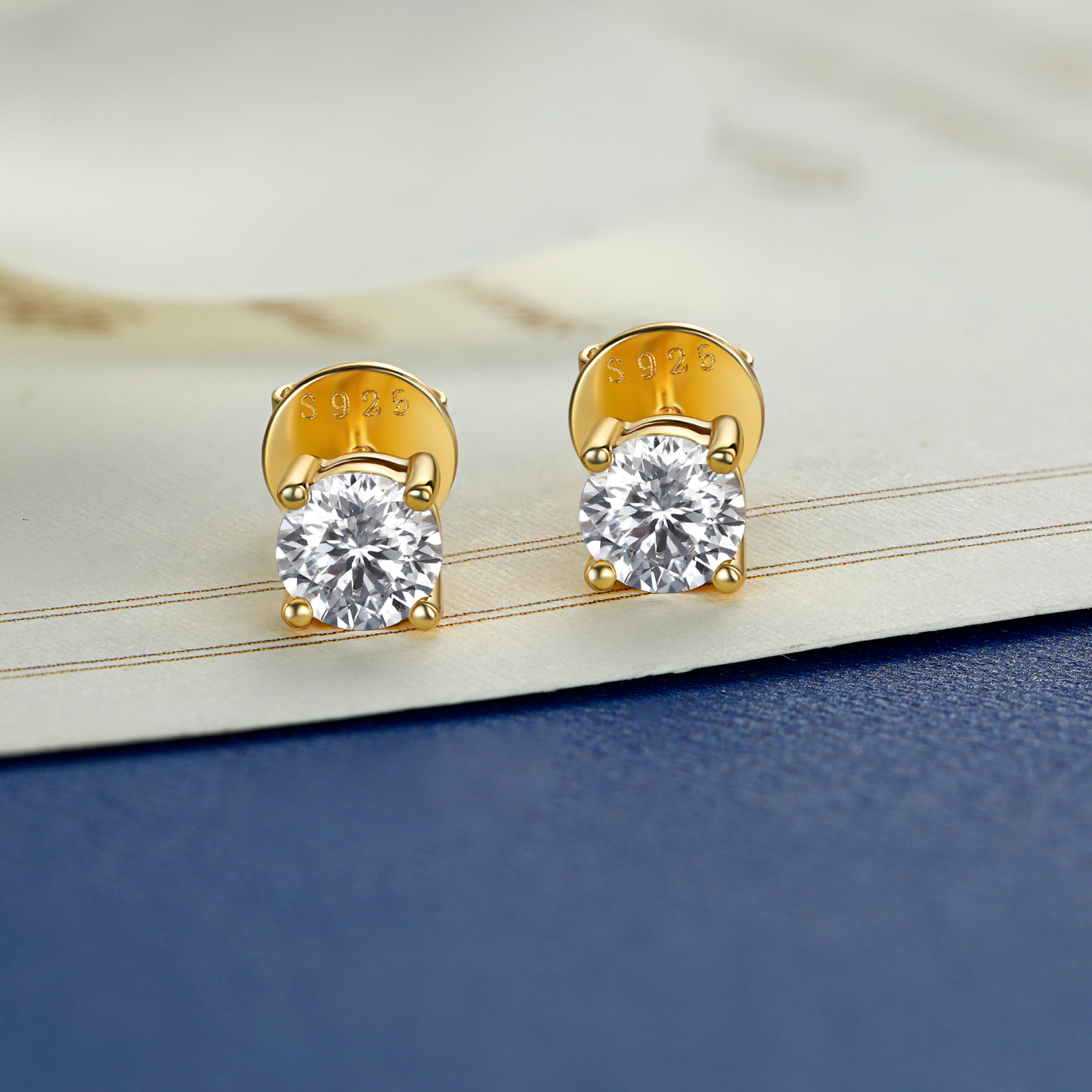4 Prong Round Stud Moissanite Earrings in Yellow Gold (D Color VVS1)