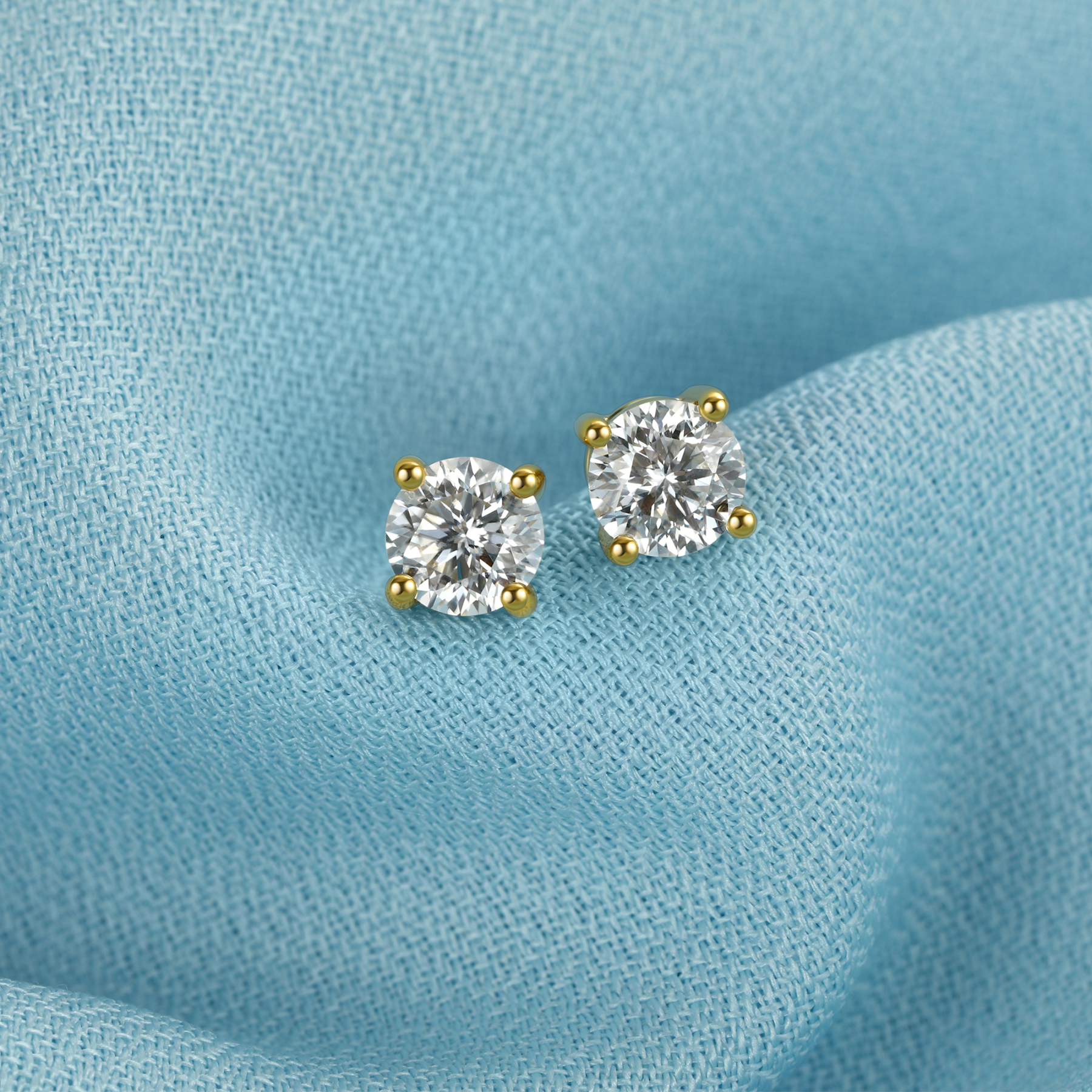 4 Prong Round Stud Moissanite Earrings in Yellow Gold (D Color VVS1)