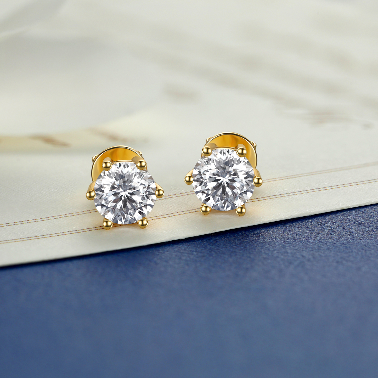 6 Prong Round Stud Moissanite Earrings in Yellow Gold (D Color VVS1)