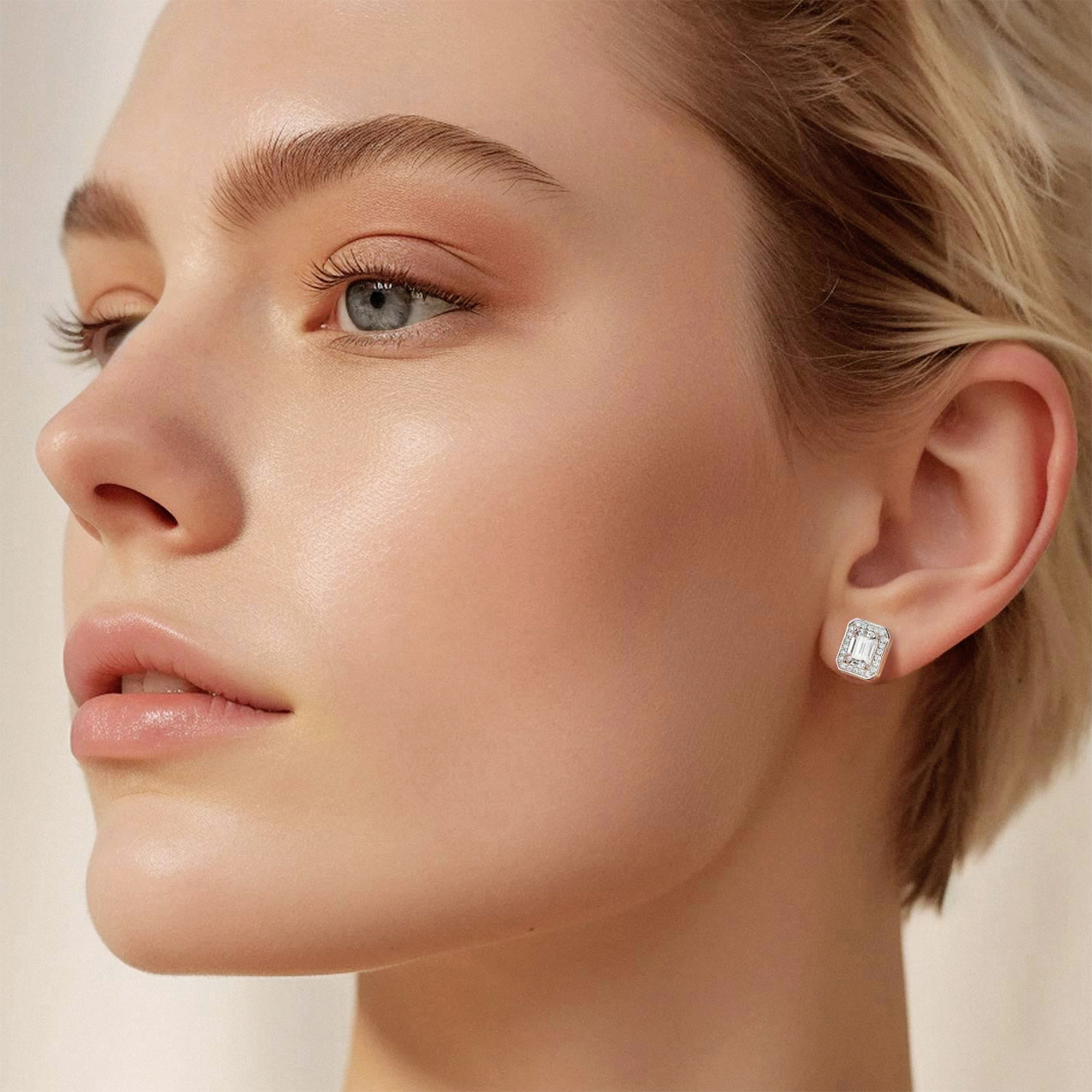 Halo Emerald Cut Stud Moissanite Earrings (1 Ct. VVS1)