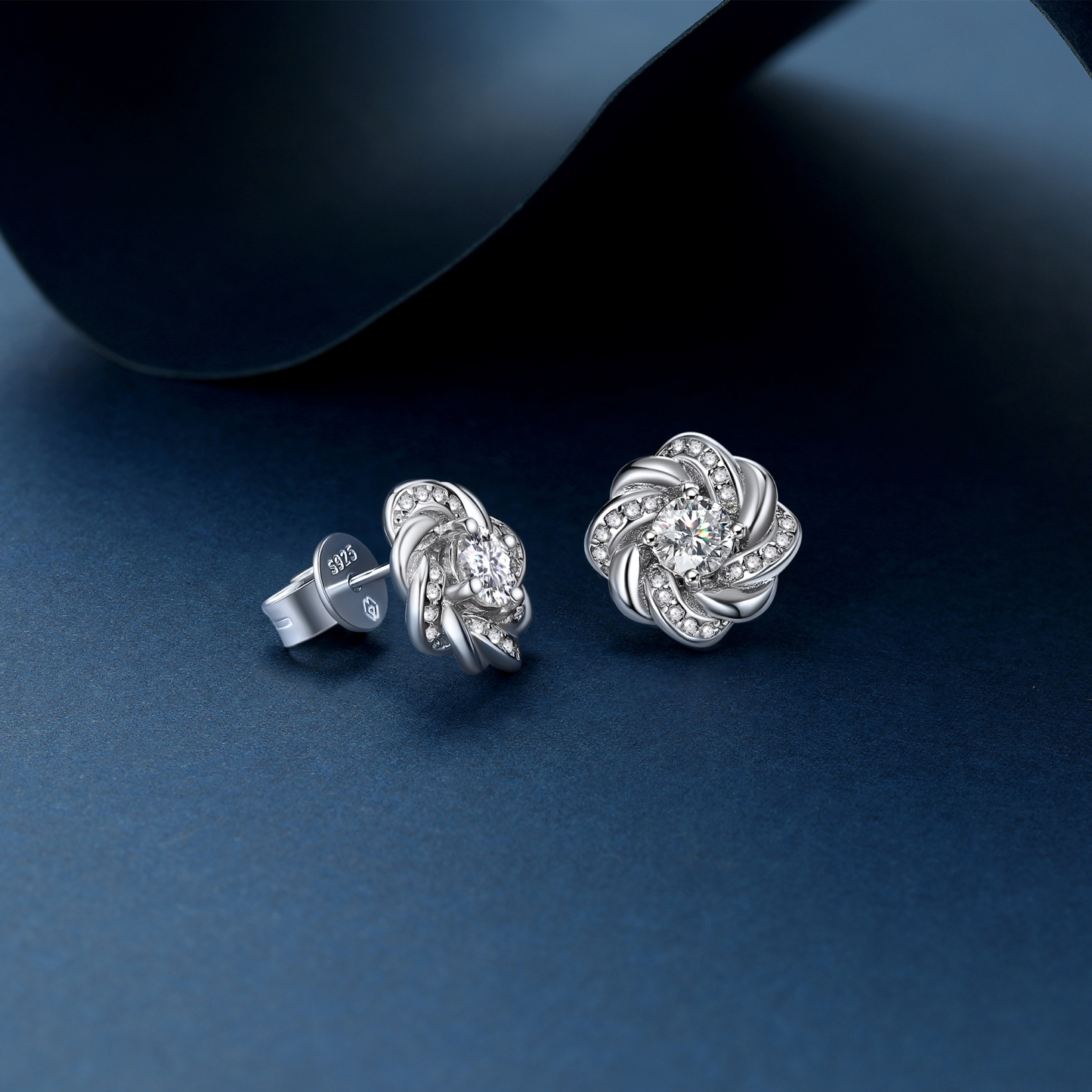 Twisted Vine Round Stud Moissanite Earrings in White Gold (1/2 Ct. VVS1)
