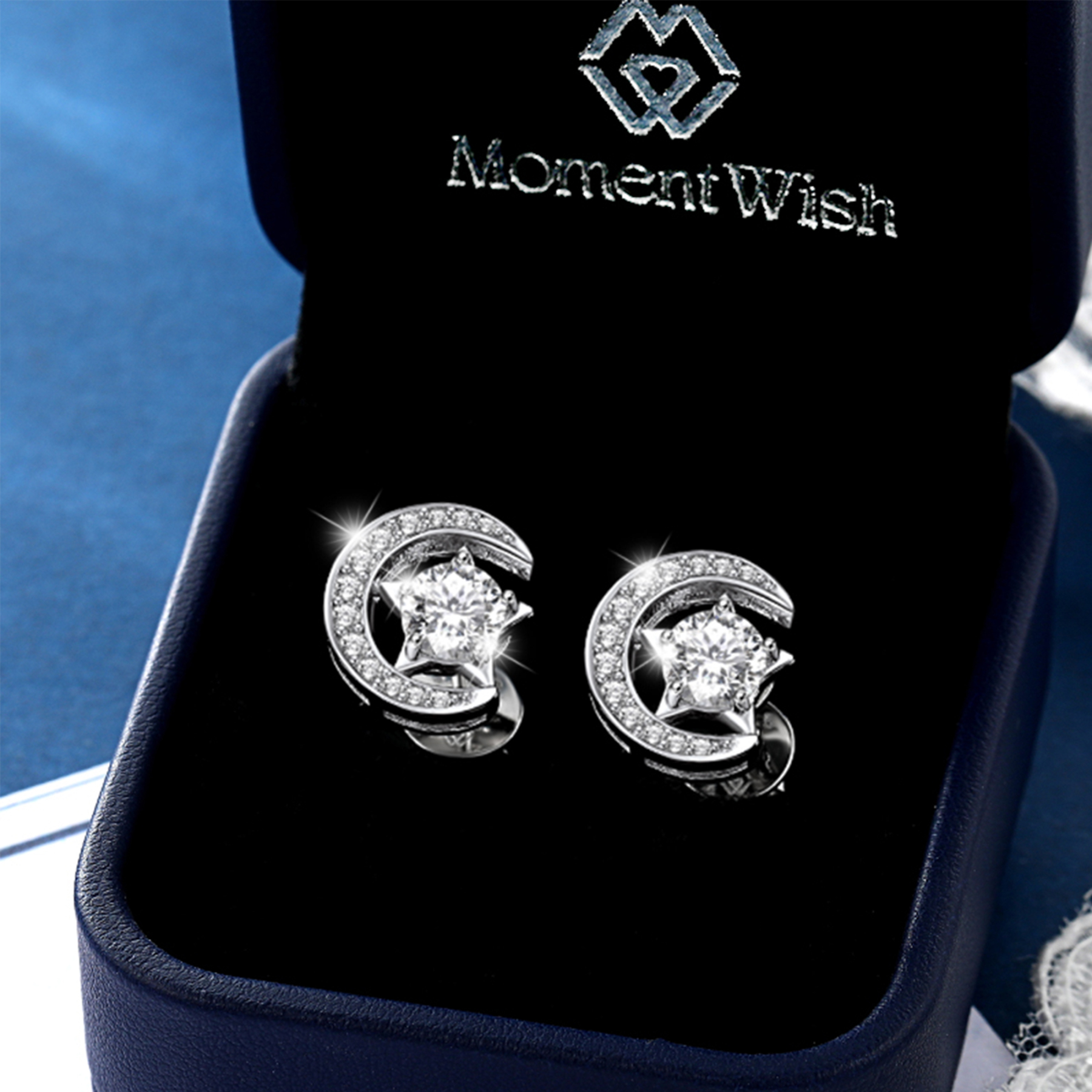 Moon & Star Stud Moissanite Earrings in White Gold (1/2 Ct. VVS1)