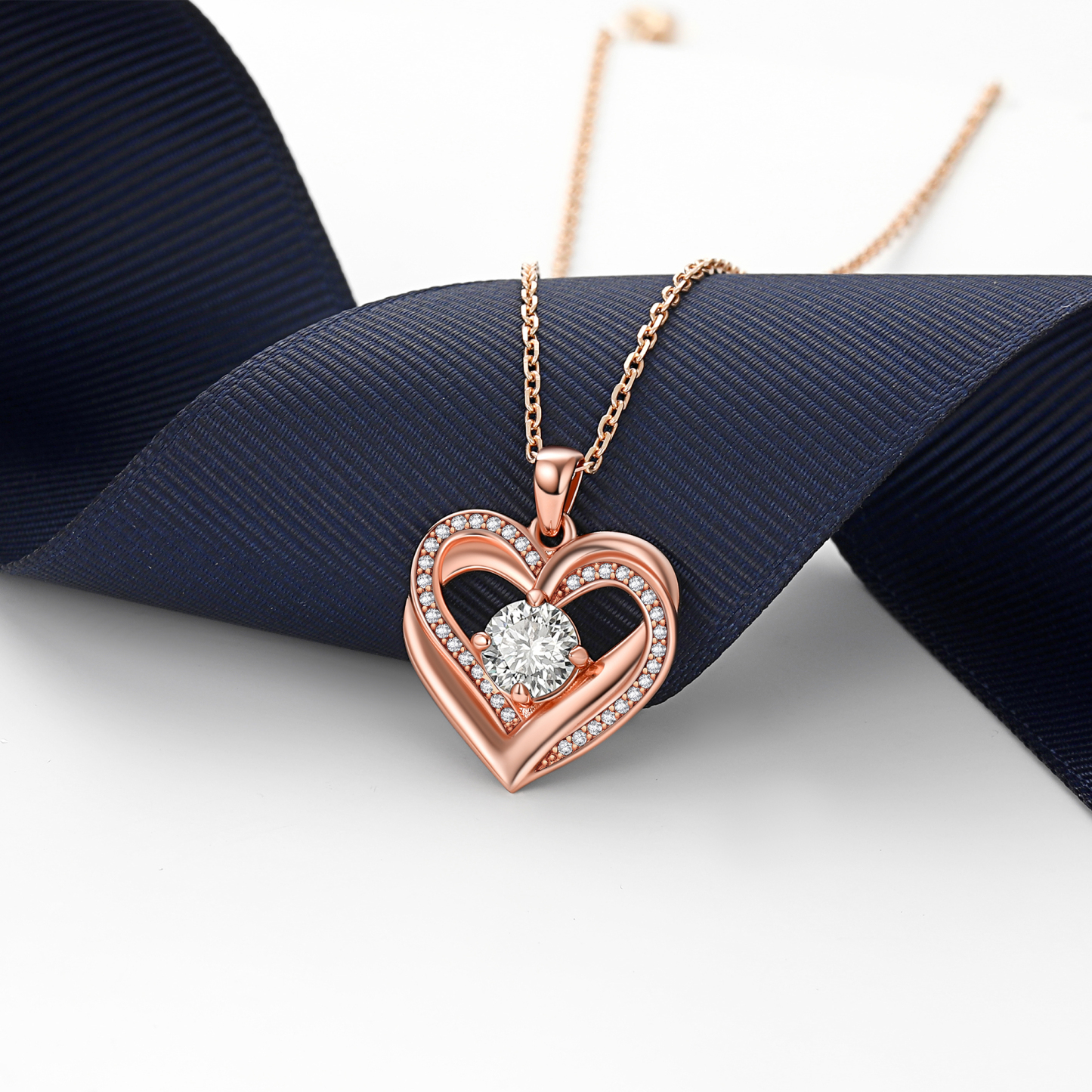 4 Prong Round Pendant Moissanite Double Heart Necklace in Rose Gold (1 Ct. VVS1)