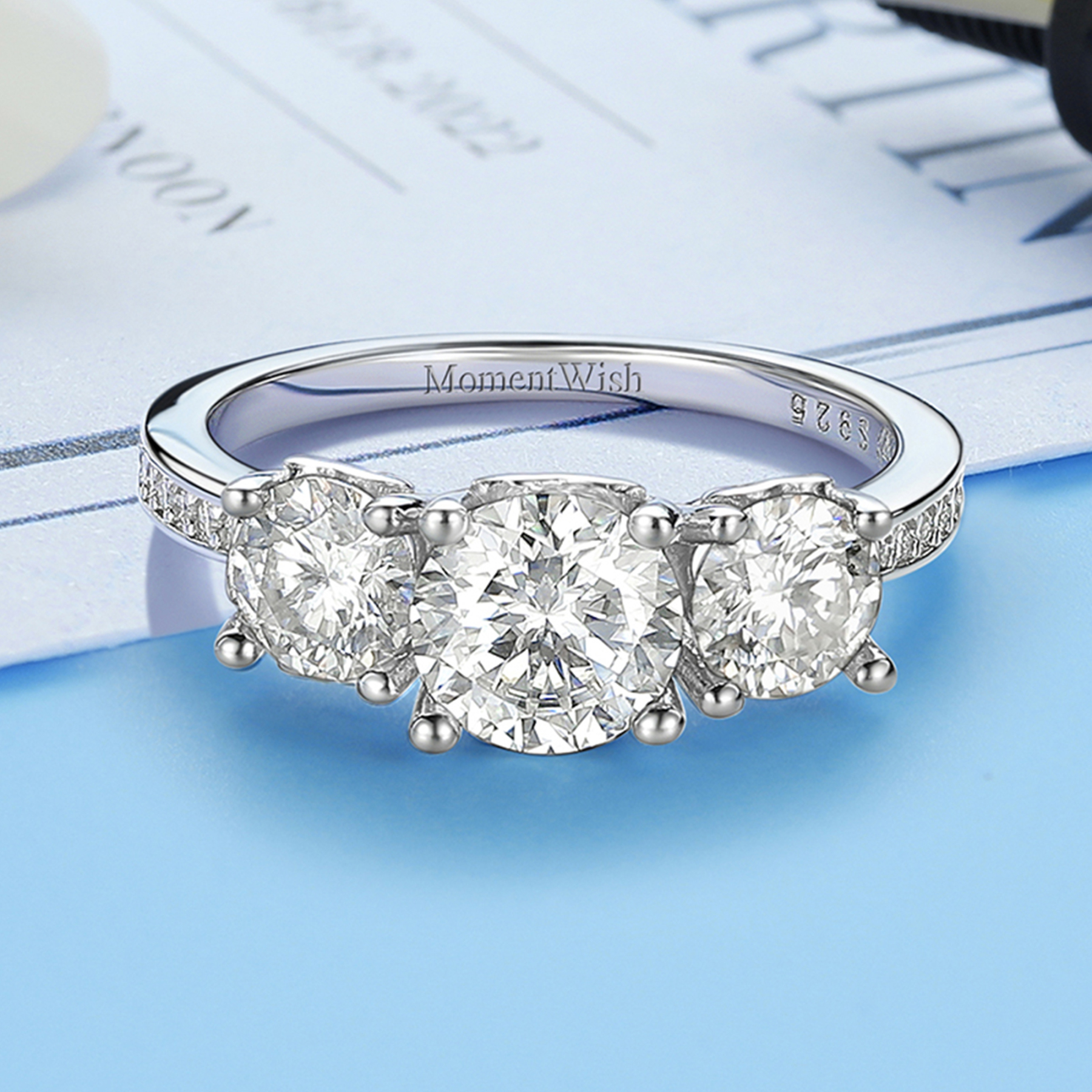Three-Stone Round and Pavé Set Moissanite Engagement Ring (D Color VVS1)