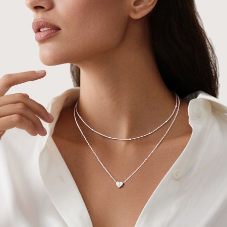 Double-layered initial heart necklace