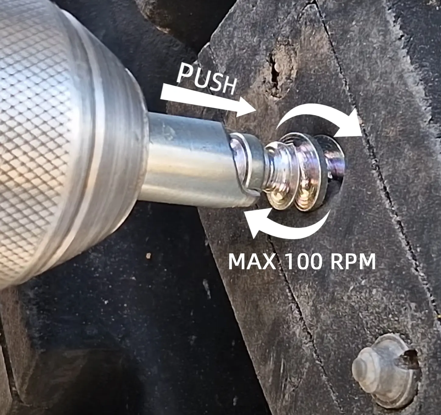 {"default":"Installing screw tire studs with drill and tool clockwise"}
