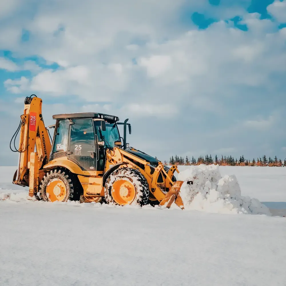 Construction machinery studs providing traction in icy conditions