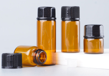 Collective Amber glass travel bottle accessories and caps