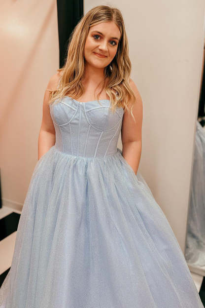 Light purple long prom dress with spaghetti straps in an A-line cut