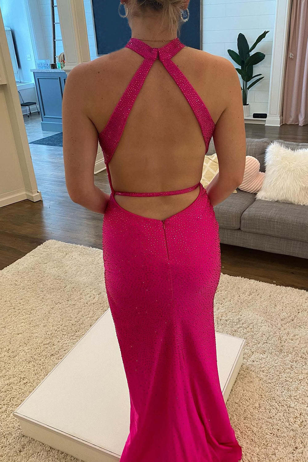 Long Hot Pink Beaded Prom Dress with Halter Neckline and Open Back