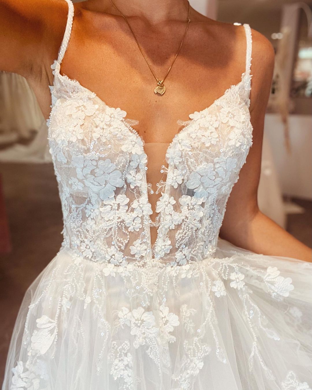 Modern Spaghetti-Straps Backless Deep V-Neck Long A-Line Wedding Dress with Lace Tulle
