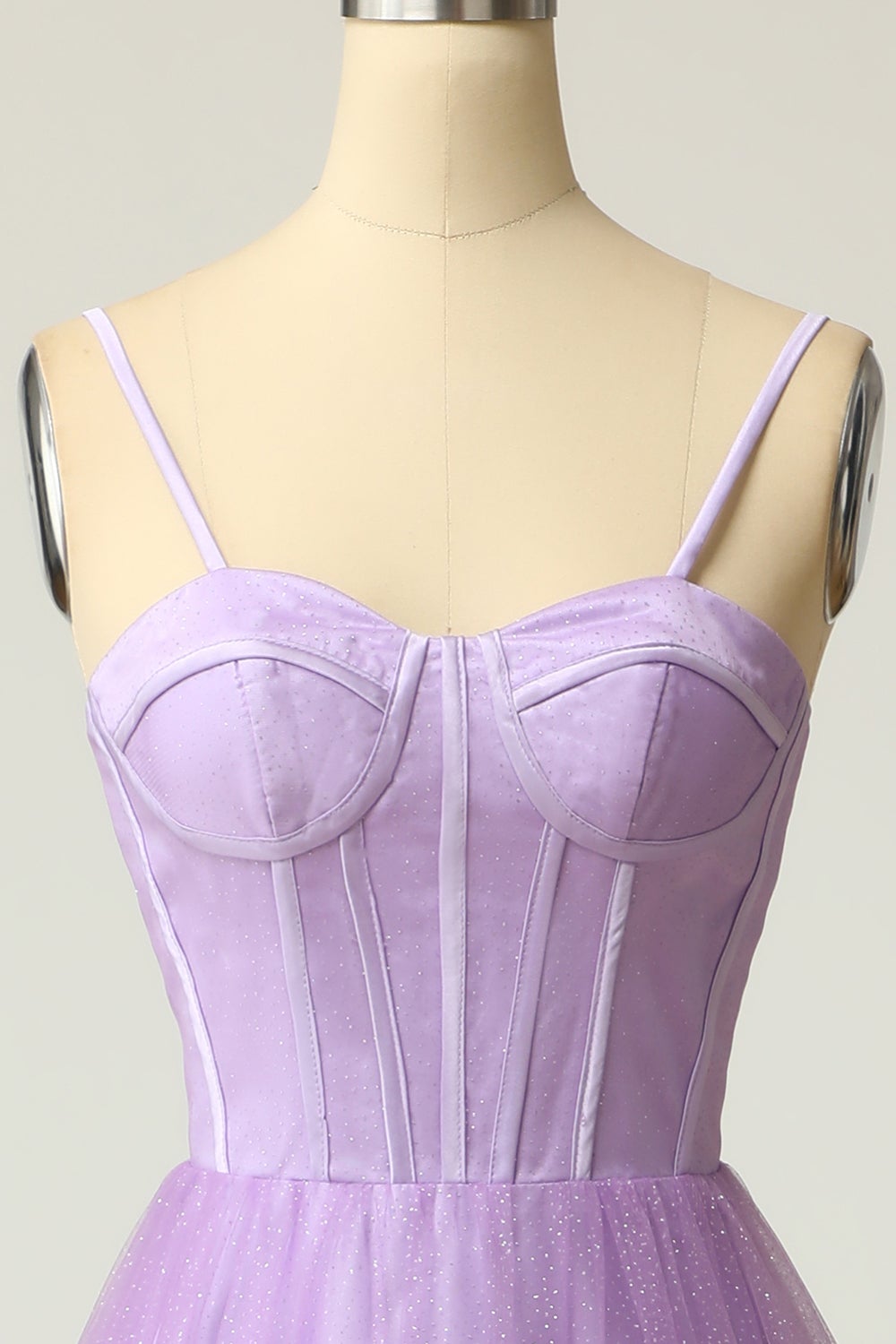 Light purple long prom dress with spaghetti straps in an A-line cut