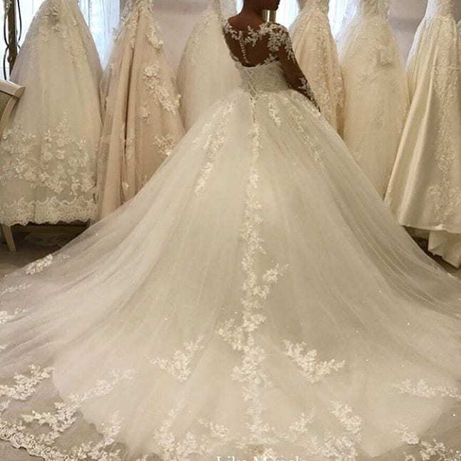 Beautiful Appliques A-Line Bateau Long Sleeves Wedding Dress with Tulle Lace Ruffles