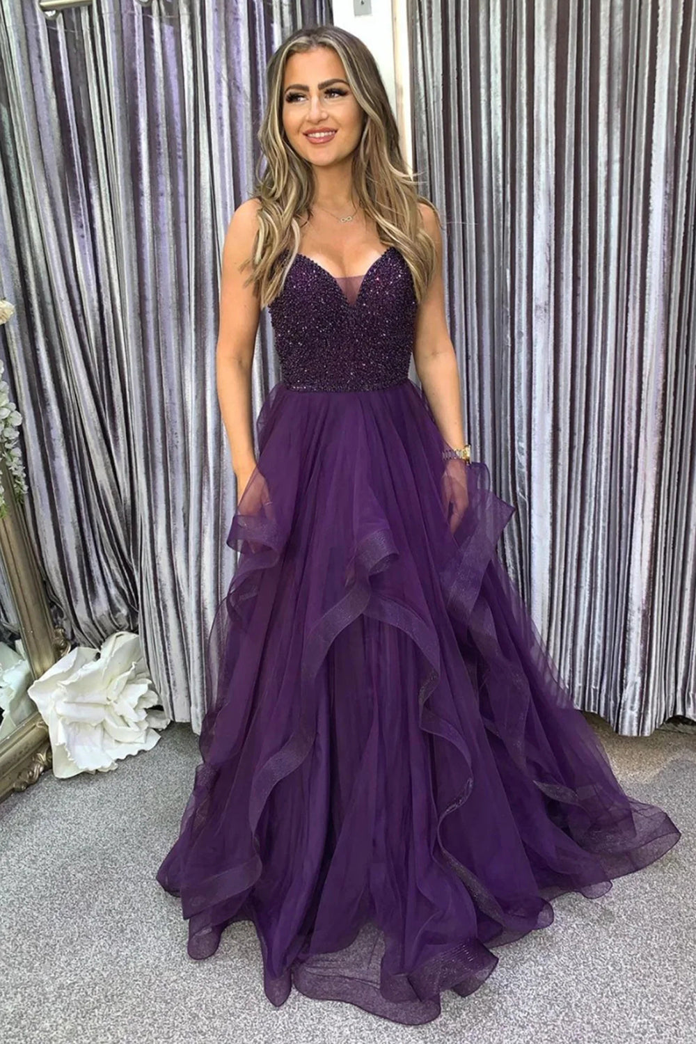 Long Dark Purple Prom Dress with Spaghetti Straps and Beading in an A-Line Cut