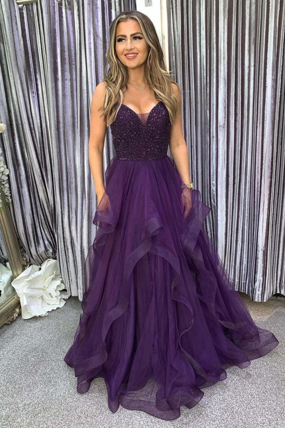 Long Dark Purple Prom Dress with Spaghetti Straps and Beading in an A-Line Cut