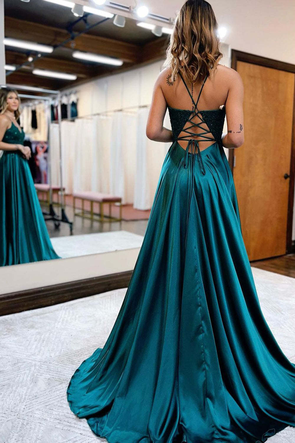 Long Green Prom Dress with Spaghetti Straps and Appliques in an A-Line Silhouette