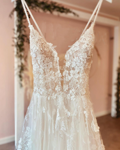 Modern Spaghetti-Straps Backless Deep V-Neck Long A-Line Wedding Dress with Lace Tulle