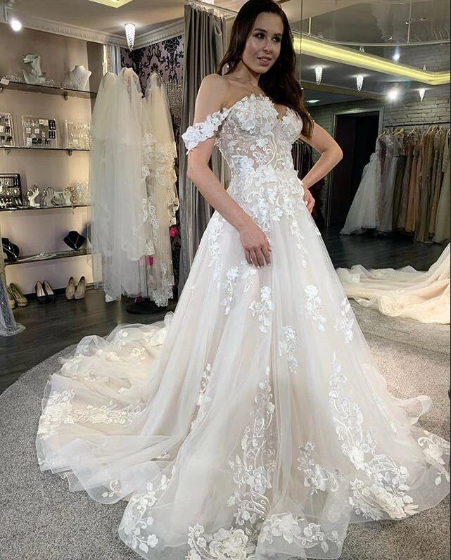 Elegant Long A-Line Tulle Off-the-Shoulder Wedding Dress with Lace Appliques