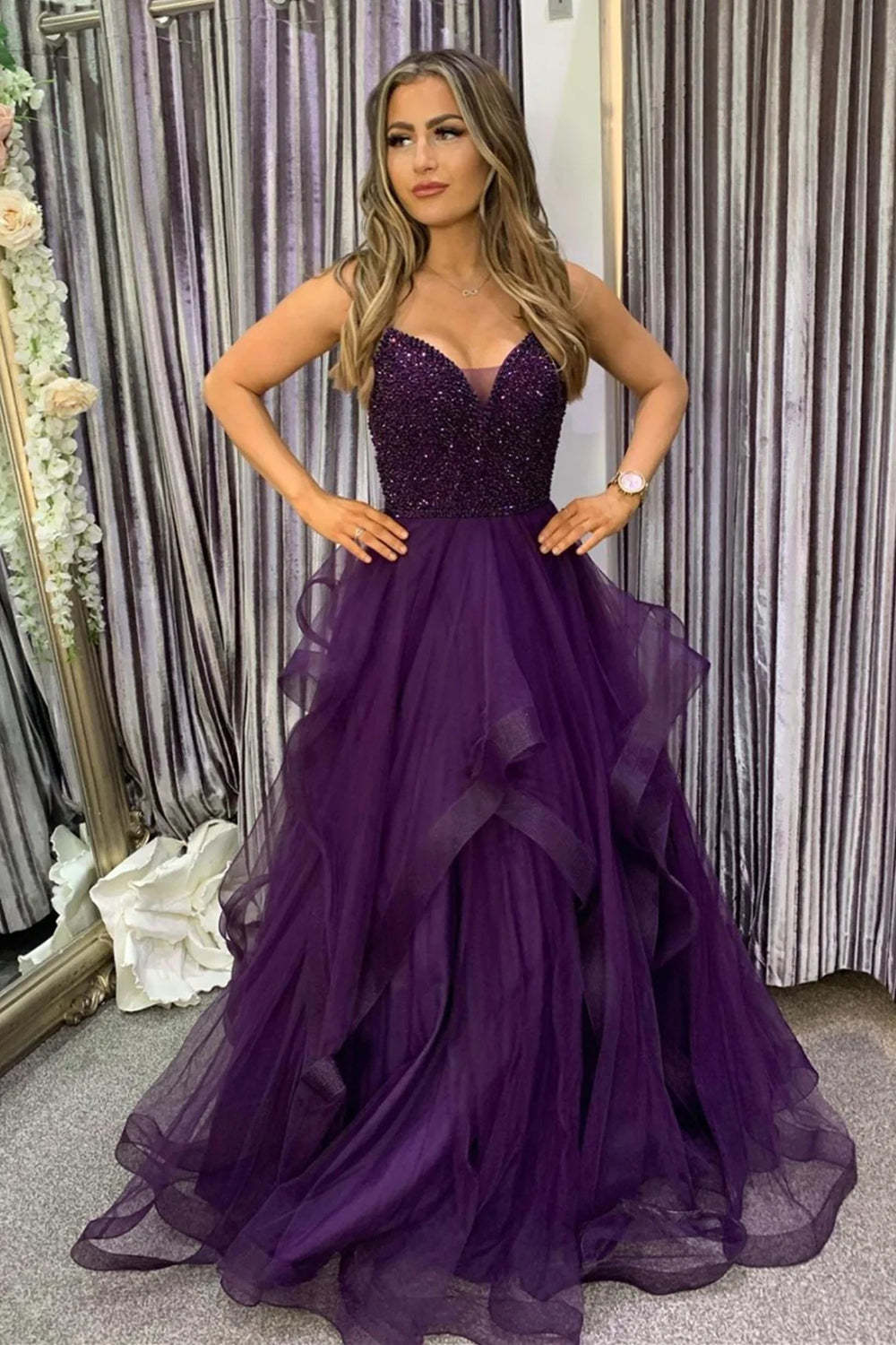 Long Dark Purple Prom Dress with Spaghetti Straps and Beading in an A-Line Cut
