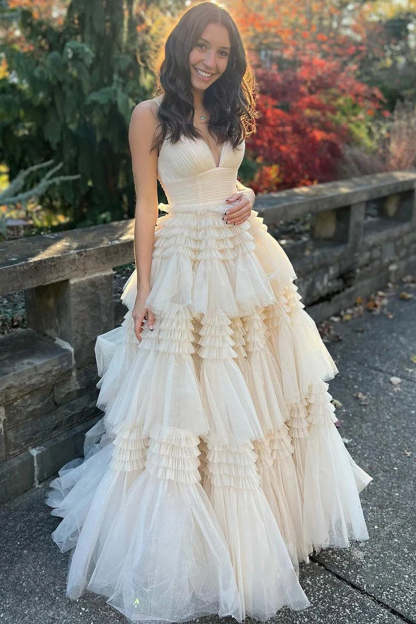Long White Prom Dress with Tiered Tulle and Spaghetti Straps Featuring a Slit
