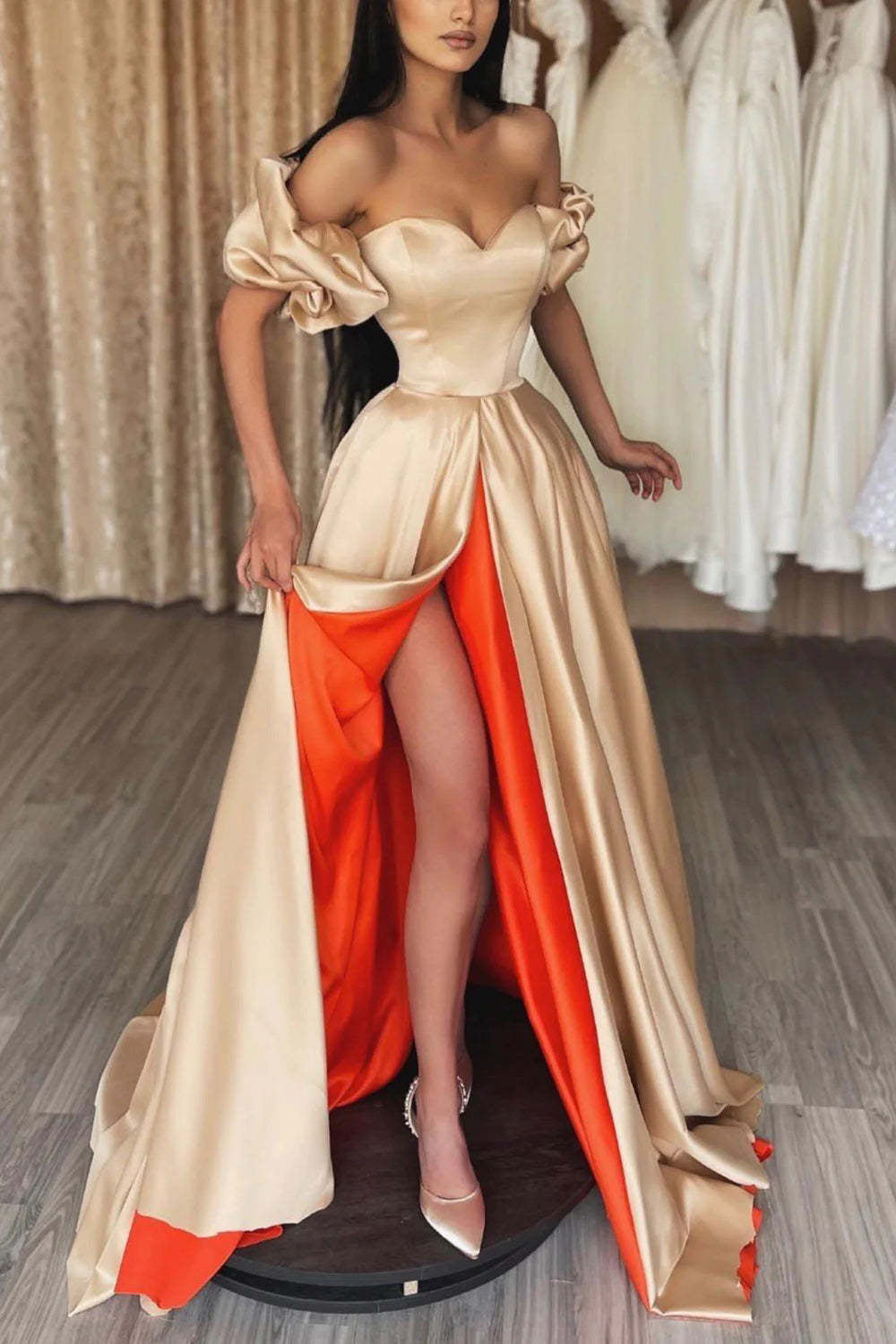 Champagne long prom dress featuring an off-the-shoulder A-line cut and front split