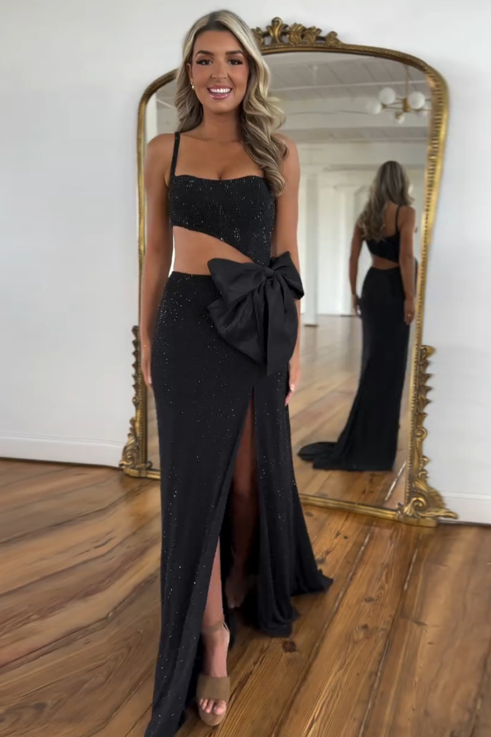 Long Prom Dress in Sparkly Black with Mermaid Cut-out and Spaghetti Straps Featuring a Bow