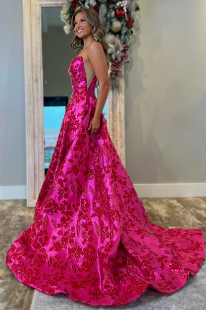 Elegant Fuchsia Floral Jacquard Princess Gown with Strapless Design
