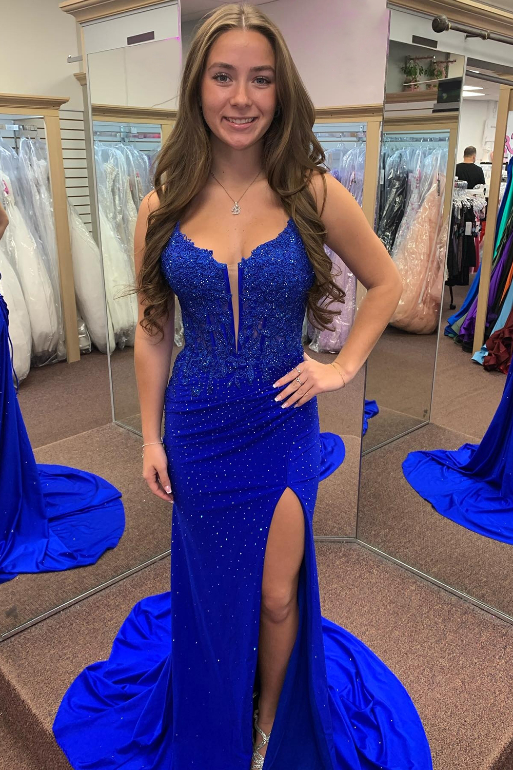 Long Red Corset Prom Dress with Beaded Applique and Spaghetti Straps Featuring a Slit