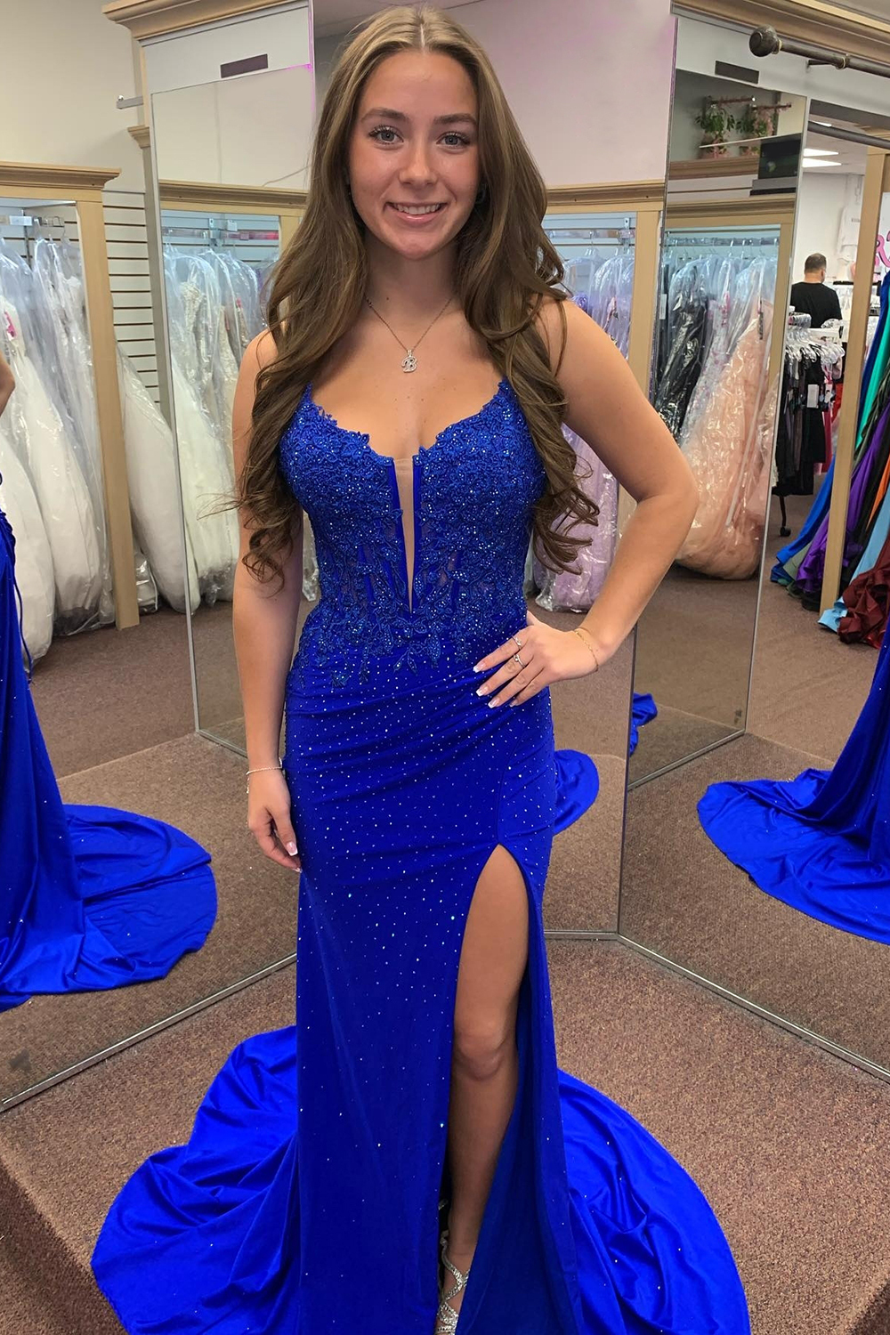 Long Red Corset Prom Dress with Beaded Applique and Spaghetti Straps Featuring a Slit