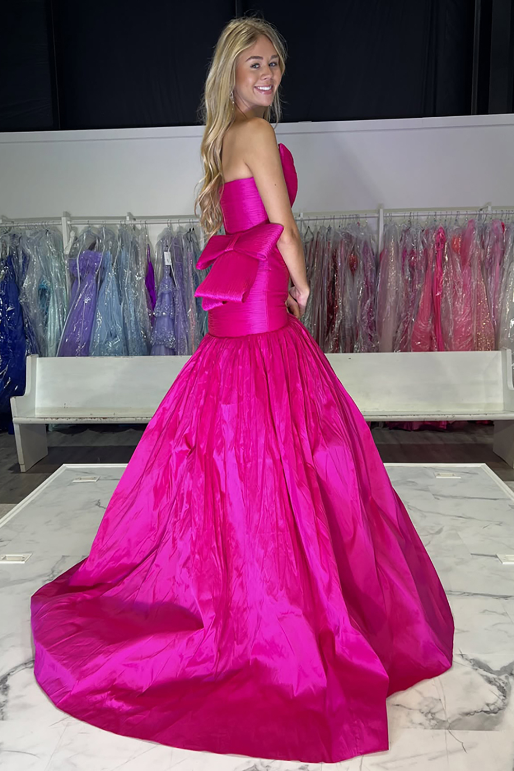 Long Strapless Satin Prom Dress in Fuchsia with Ruched Mermaid Design and Bow