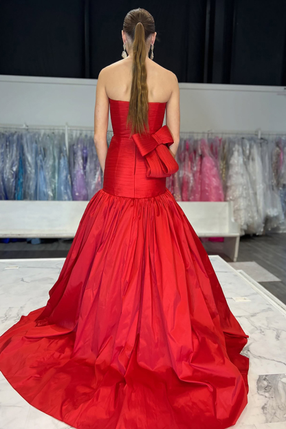 Long Strapless Satin Prom Dress in Fuchsia with Ruched Mermaid Design and Bow