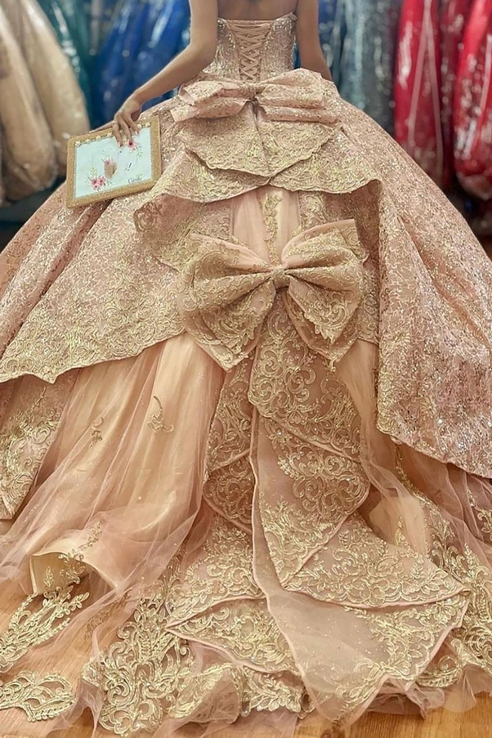Off-the-Shoulder Dusty Rose Ball Gown with Sparkly Sequins and Beading for Quinceanera