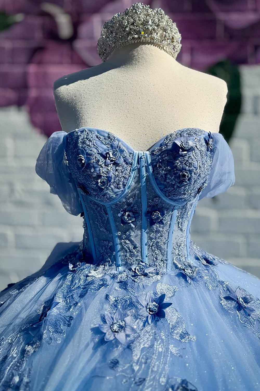 Off the Shoulder Blue Princess Organza Quinceanera Dress Featuring a Bow and Applique