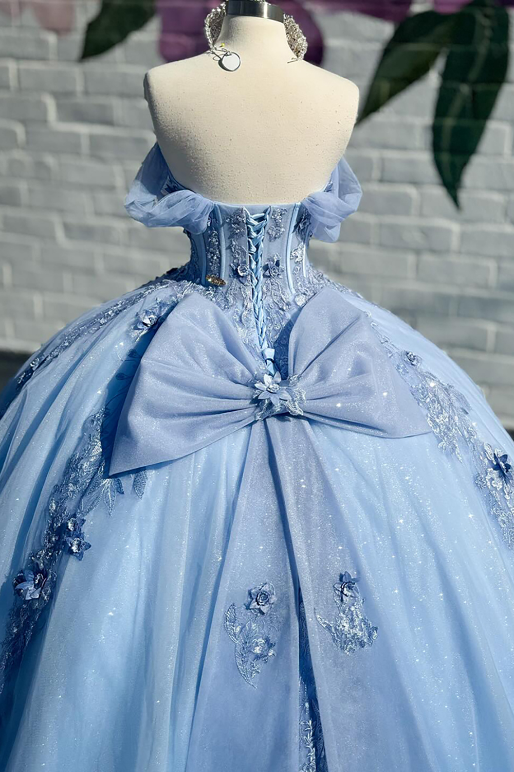 Off the Shoulder Blue Princess Organza Quinceanera Dress Featuring a Bow and Applique