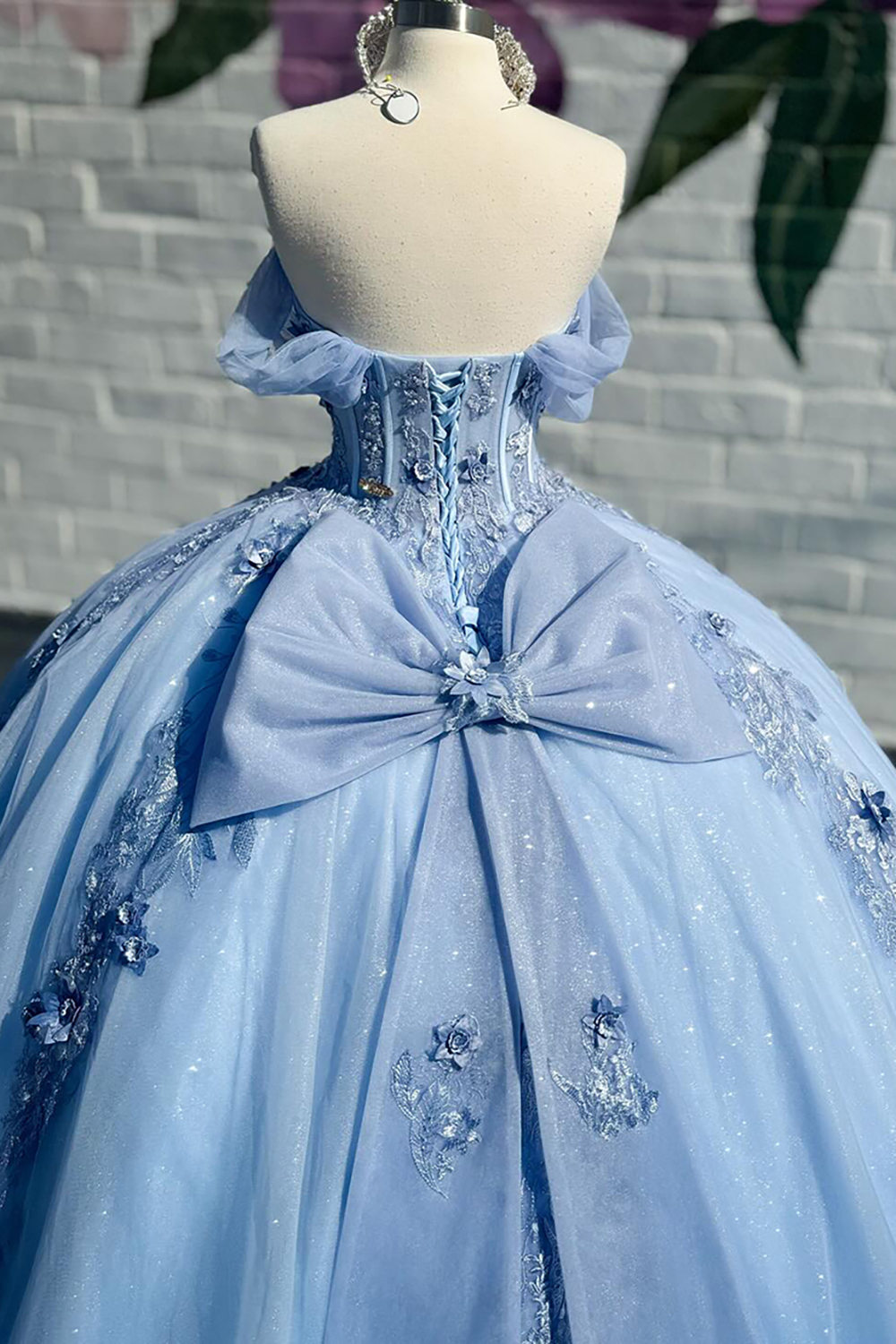Off the Shoulder Blue Princess Organza Quinceanera Dress Featuring a Bow and Applique