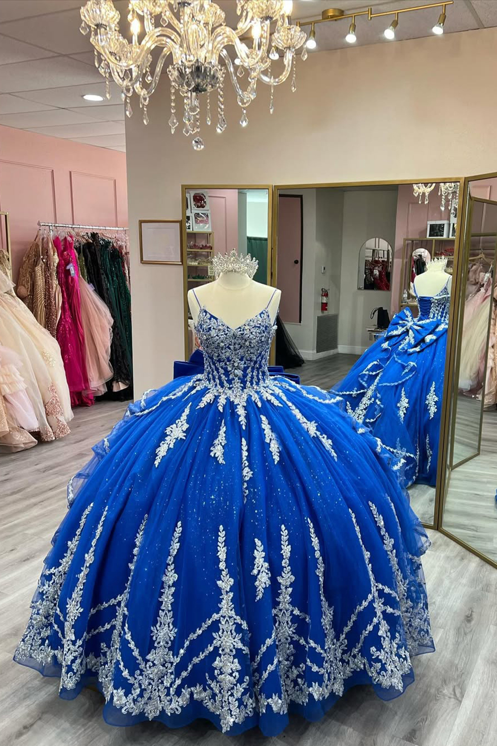 Princess Quinceanera Dress in Royal Blue Tulle with Spaghetti Straps and Bow Applique