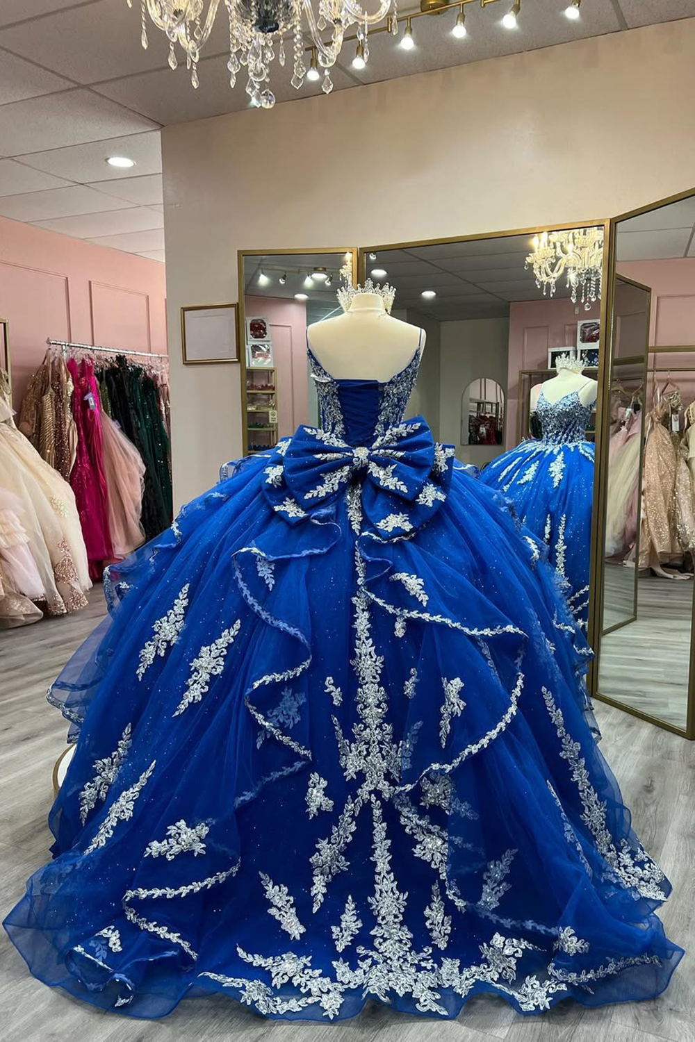 Princess Quinceanera Dress in Royal Blue Tulle with Spaghetti Straps and Bow Applique