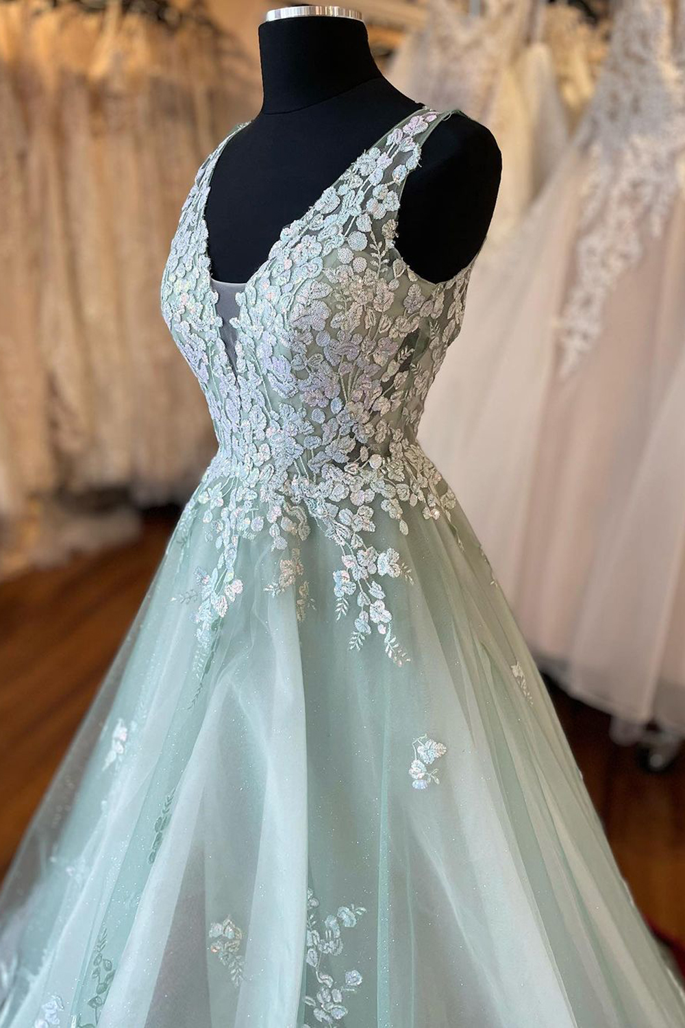 Elegant Light Green A-Line Prom Dress with Deep V-Neck and Appliques