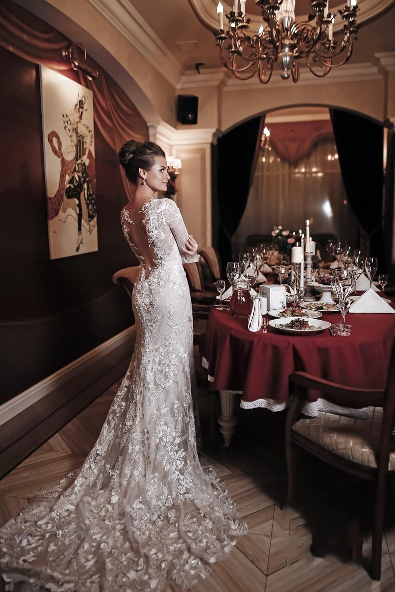 Charming White High Neck Backless Mermaid Long Sleeve Wedding Dress with Appliques Lace