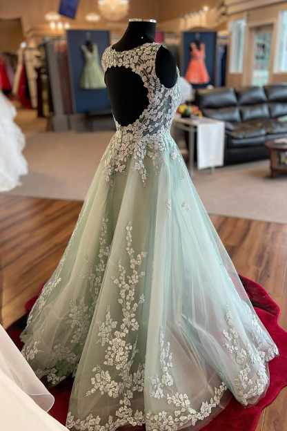 Elegant Light Green A-Line Prom Dress with Deep V-Neck and Appliques